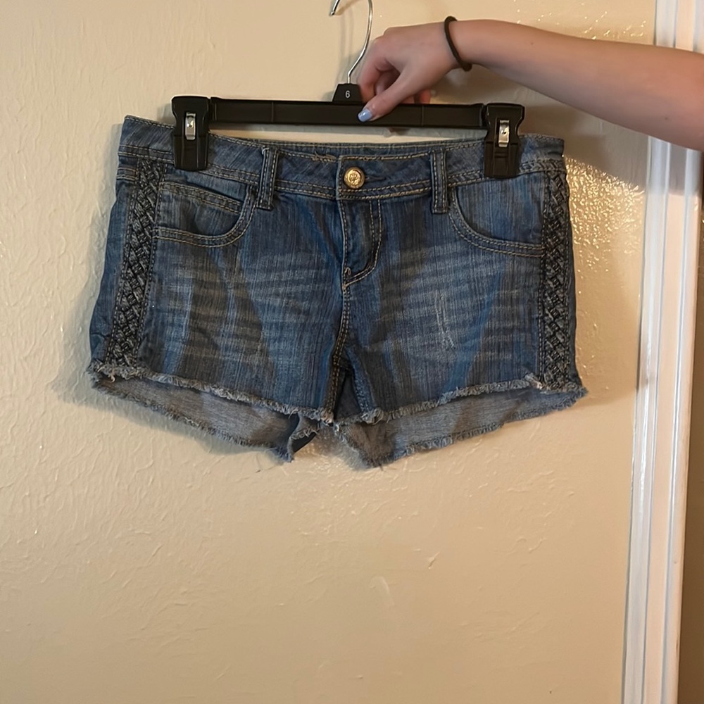 Size 9- Low rise denim shorts with rope detailing on side